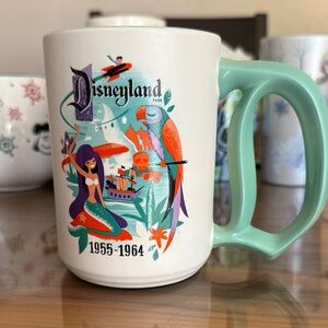 Disney Mint Green and White Mug with Vintage Design